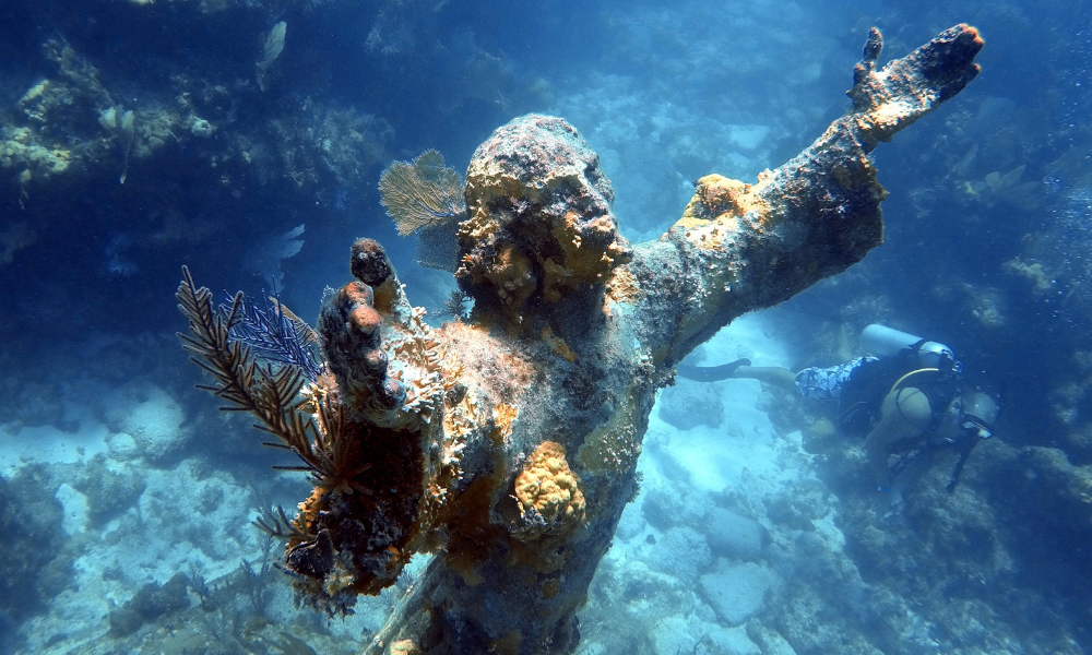 Sculpture under water in a coral reef
